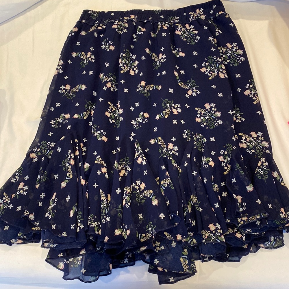 Flary navy skirt with flower pattern! Good condition!